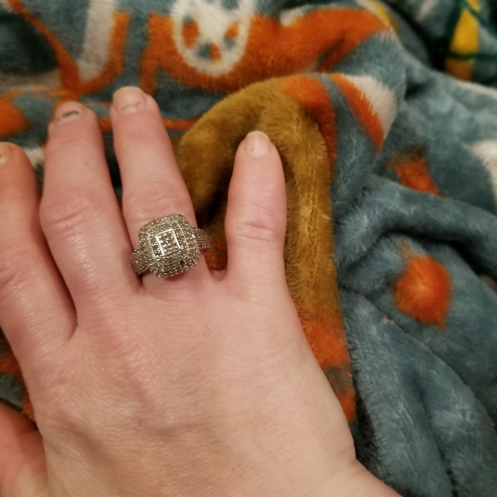 1.25 c.f. natural marques diamond ring